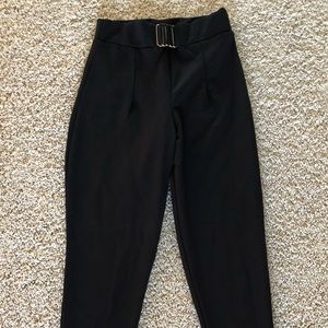 Black pants with gold buckle